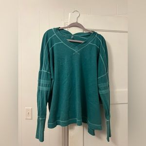 FP movement teal jersey style pullover with thumb holes